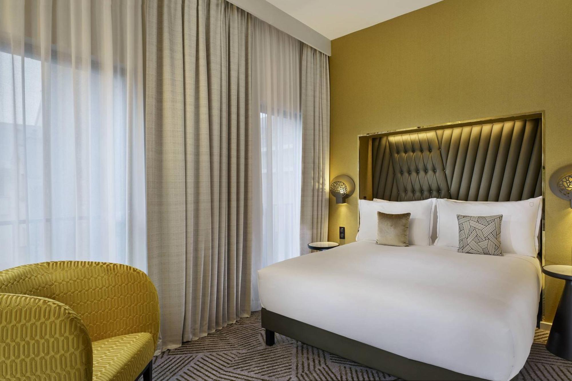 La Caserne Chanzy Hotel & Spa, Autograph Collection Reims Exterior foto A bedroom at the hotel